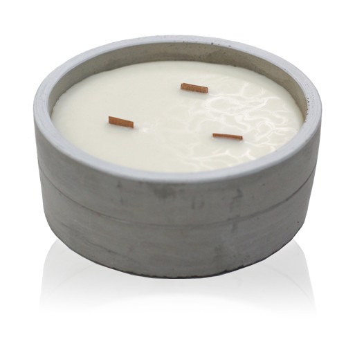 Vela aromática de hormigón – Vainilla y naranja triturada