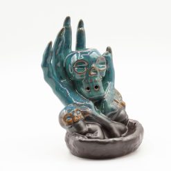 Alternative view of Quemador de incienso de flujo inverso - Calavera en la mano